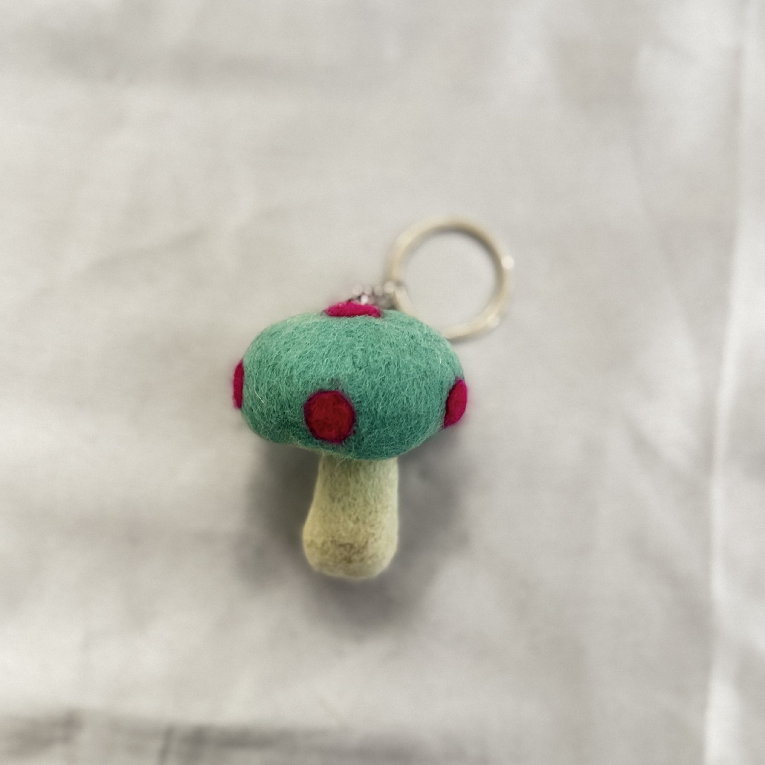 light blue mushroom felt keychain light blue mushroom felt keychain